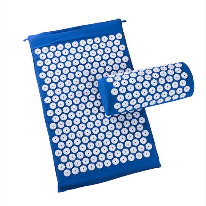 Golden massage acupuncture and sports mat with textured surface for muscle relief and relaxation.