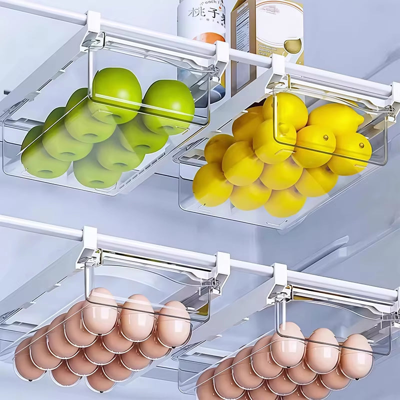 Transparent refrigerator drawer storage box for vegetables, fruits, eggs, and food organizers by RoyalSavings in a kitchen fridge.