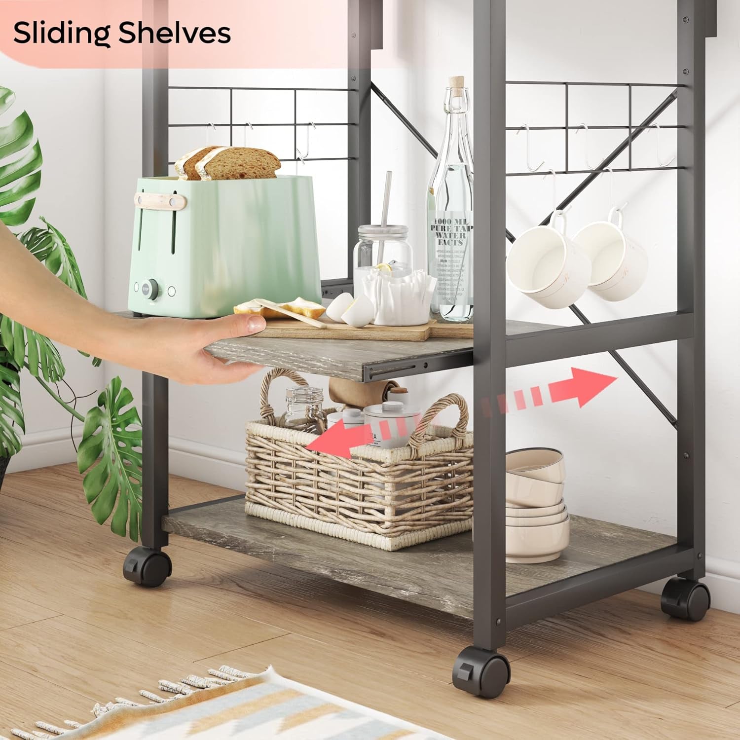 RoyalSavings kitchen bakers rack with microwave stand, on wheels, featuring adjustable feet, storage shelves, and 10 side hooks.