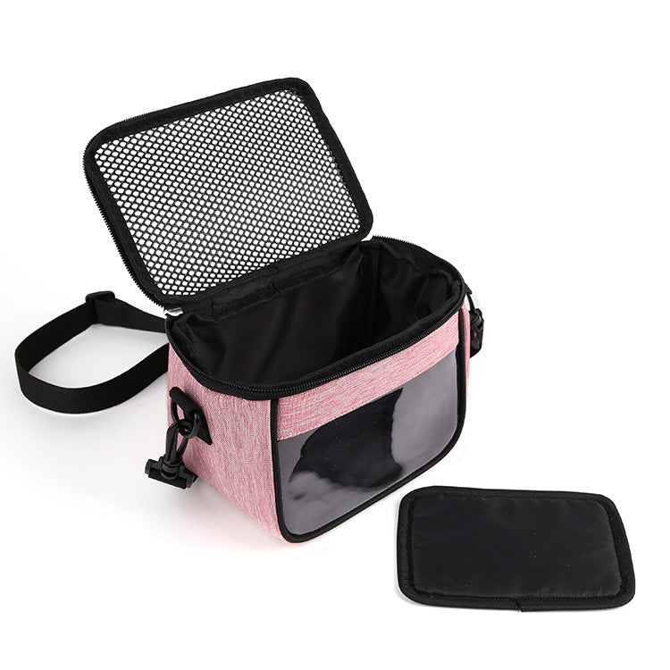 Golden crossbody pet bag for hamsters, showing a compact hamster cage with transparent sides and adjustable strap.