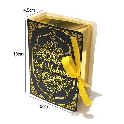 Golden Ramadan gift box with Quran-themed ornaments and decorative Ramadan elements, perfect for celebrating the holy month.