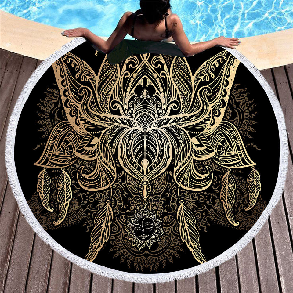 Golden microfiber beach towel with customizable design, soft fabric perfect for lounging and sunbathing at the beach.
