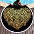 Golden microfiber beach towel with customizable design, featuring bright colors and soft, absorbent fabric for sunbathing.