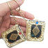 Golden Quran keychain pendant with hanging ring, featuring intricate design and compact size for religious adornment.