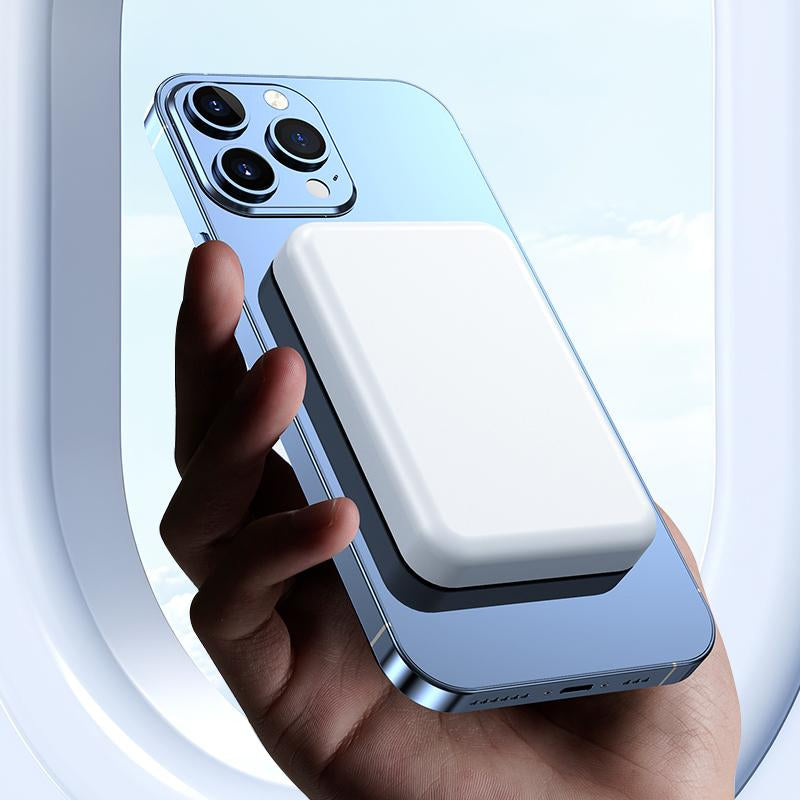 RoyalSavings 5000mAh magnetic power bank with MagSafe wireless fast charger attached to an iPhone 13 Pro, compact portable battery pack