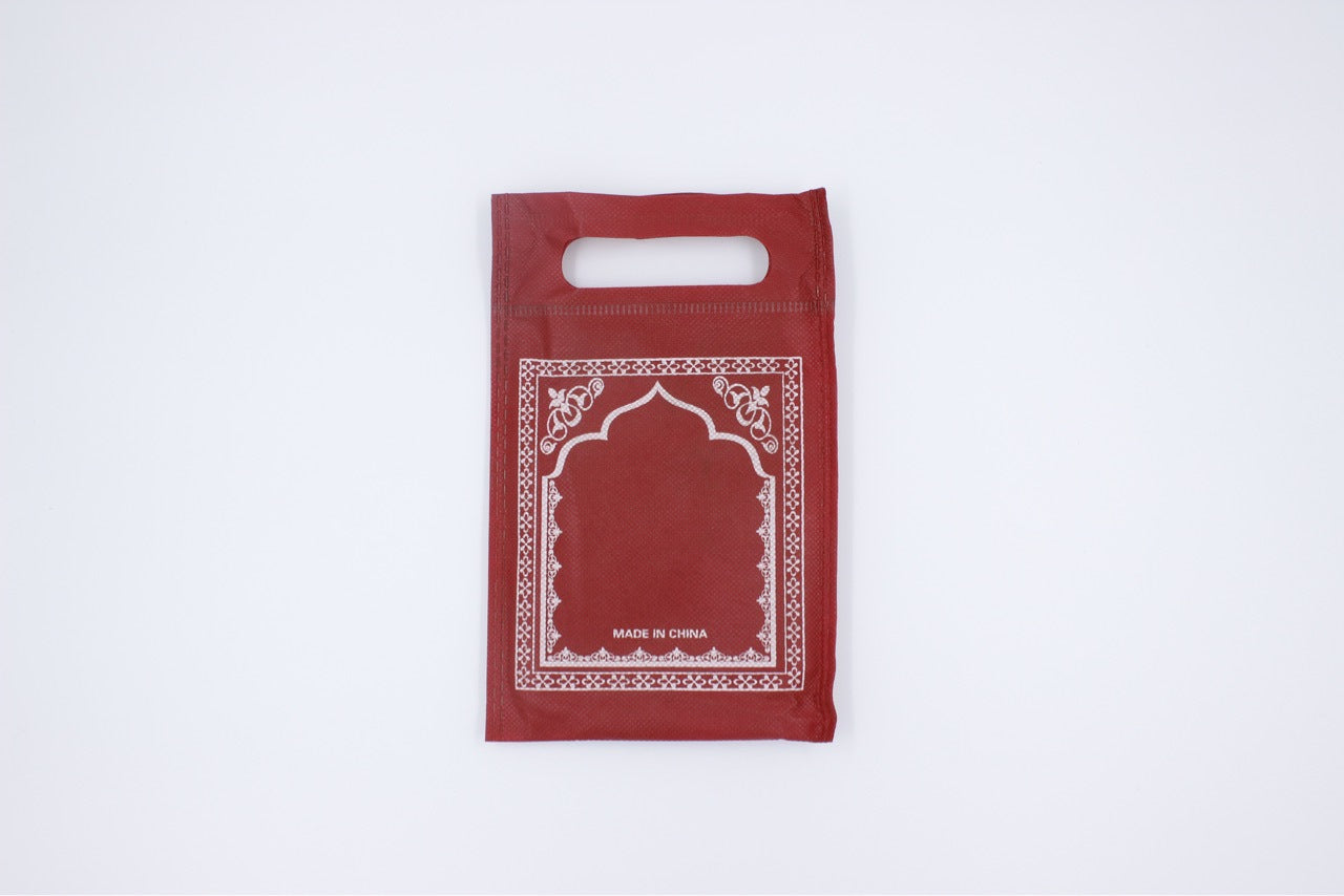 Golden prayer mat blanket with intricate Middle Eastern patterns, soft fabric, ideal for religious prayer and meditation.