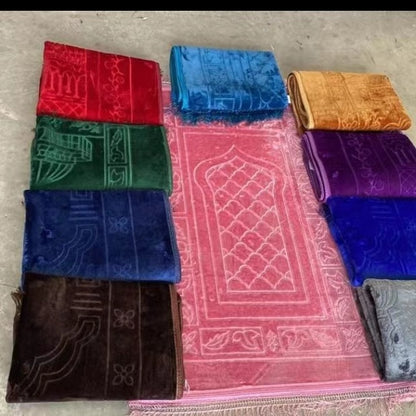 Golden Raschel embossed prayer mat with tassels in solid color, featuring intricate textured design and soft fabric.