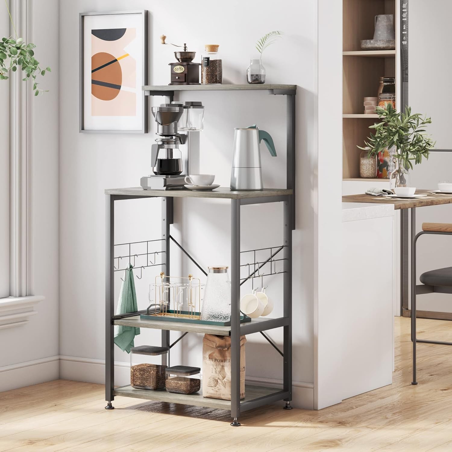 RoyalSavings kitchen bakers rack with microwave stand, on wheels, featuring adjustable feet, side hooks, and multiple storage shelves.