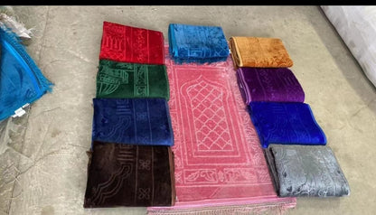 Golden Raschel embossed prayer mat with tassels in solid color, showcasing intricate embossed design and soft fabric texture.