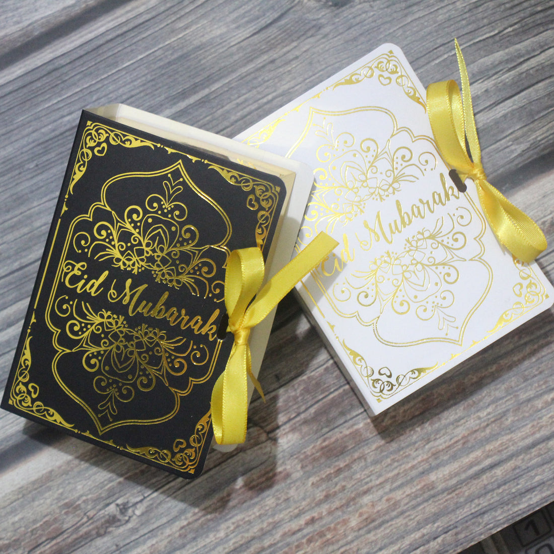 Golden Gift Box Quran Elements Ramadan Ornament with decorative Islamic design and intricate calligraphy.