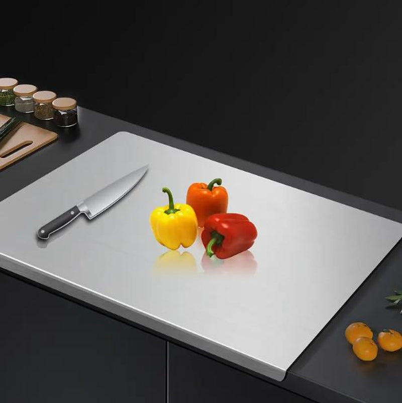 RoyalSavings stainless steel chopping board with non-slip base, ideal for kitchen cutting and meal prep.