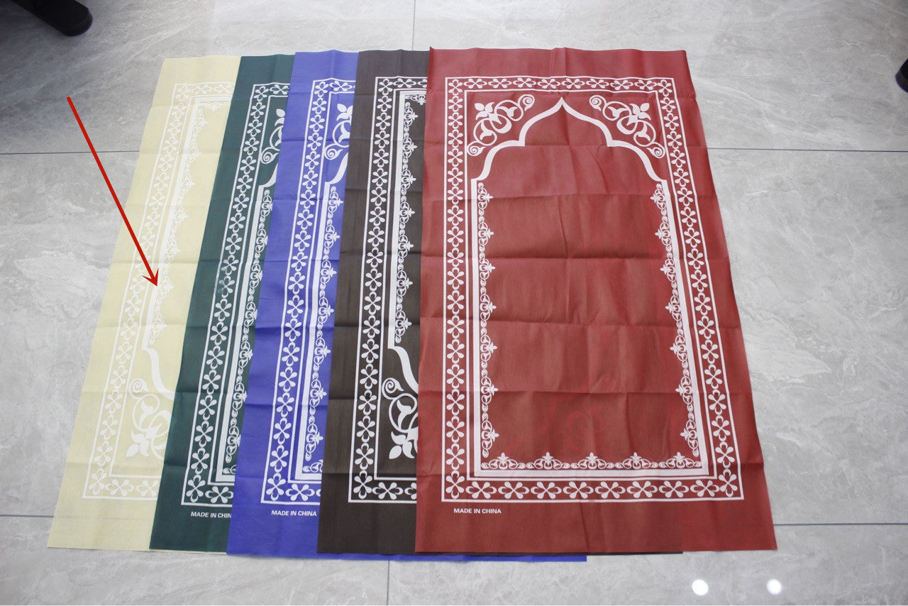 Golden prayer mat blanket featuring traditional Middle Eastern design, soft fabric with intricate patterns and vibrant colors.