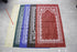 Golden prayer mat blanket featuring traditional Middle Eastern design, soft fabric with intricate patterns and vibrant colors.